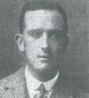 Black and White head and shoulder shot civilian collar and tie.