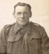 Sepia head and shoulders photograph in uniform